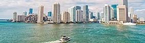FloridaConnection20220725ImagemDss concept. Architecturally impressive high rise towers. Skyscrapers and harbor. Must see attractions. Miami waterfront lined with marinas. Downtown Miami city center